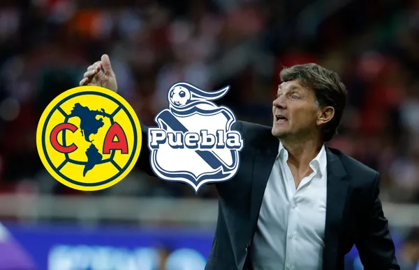 Hernán Cristante y escudos de América y Puebla/ Foto Arturo Pérez.