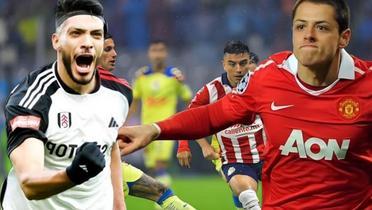 Raúl Jiménez y Javier Hernández, al fondo un partido entre América y Chivas (Foto: EFE)