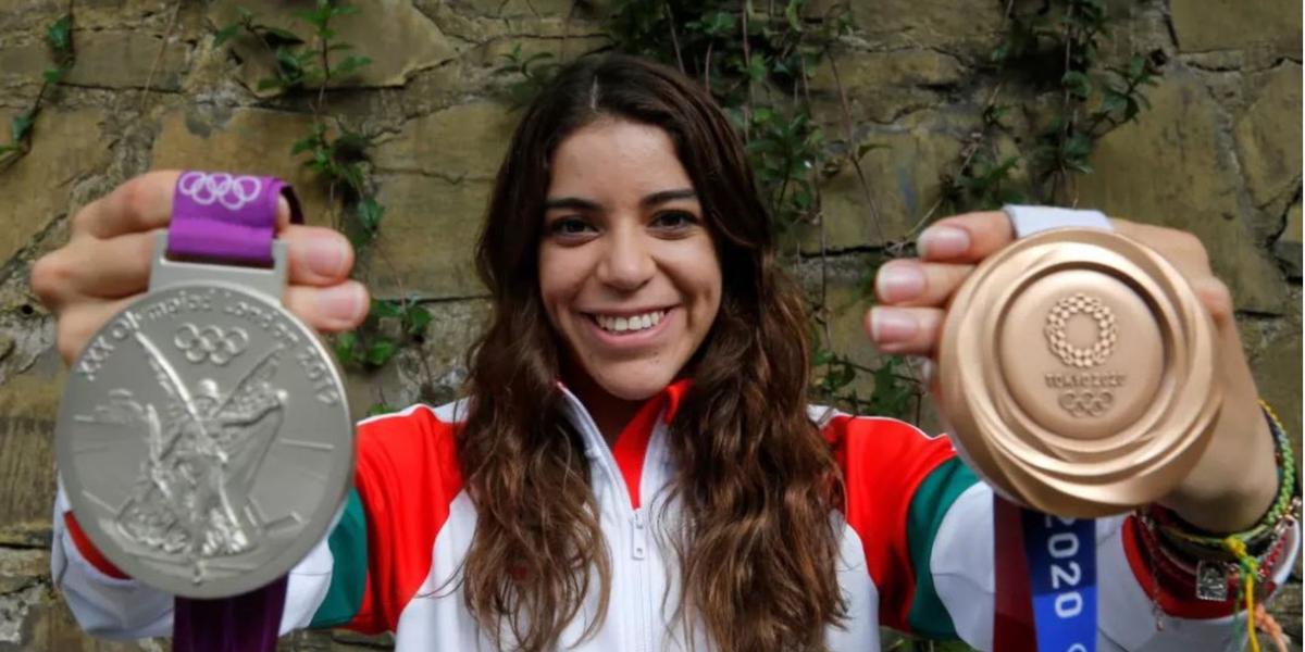 Ale Orozco con sus dos medallas olímpicas. (Foto: COM)