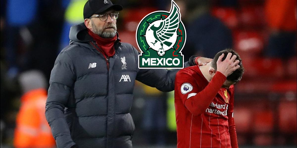 Jürgen Kloop consuela a un jugador del Liverpool (Fuente: Reuters) 