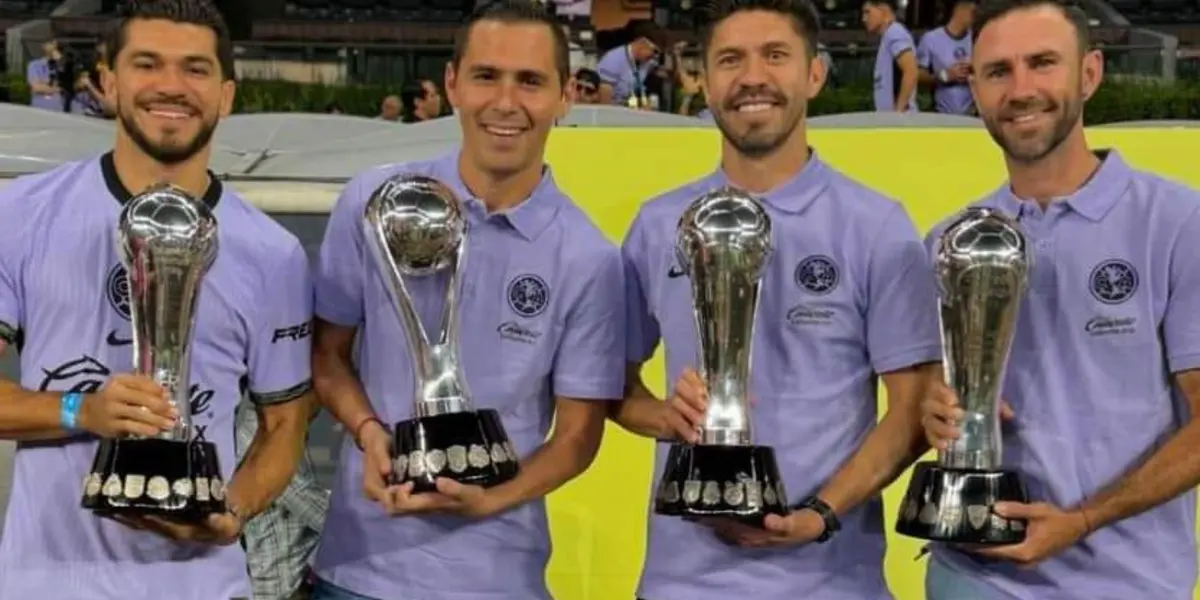 Los capitanes del América durante el festejo por el bicampeonato