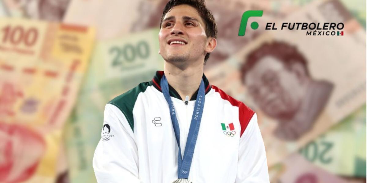 Marco Verde con la medalla de plata.